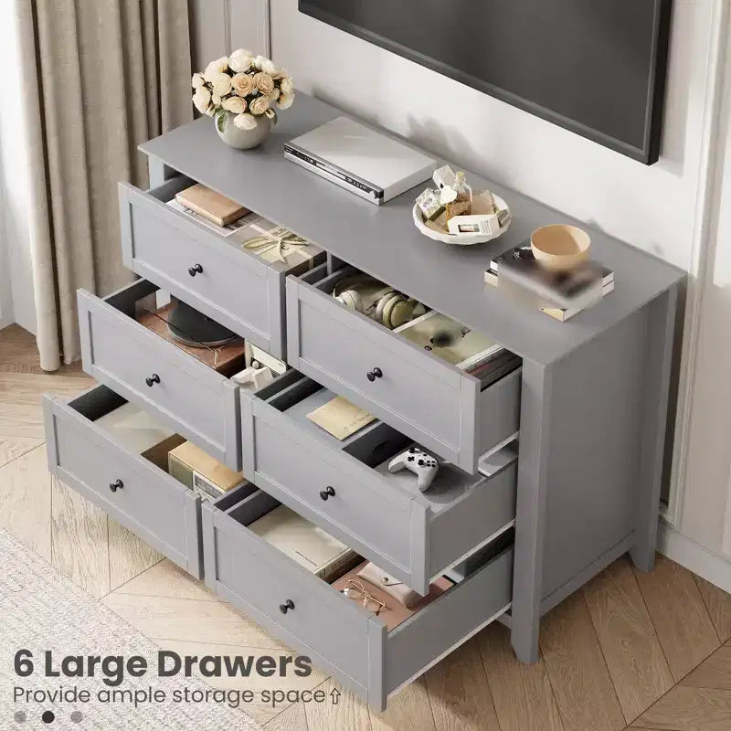 Commode en bois de 120 cm de large avec poignées métalliques ; peut servir de coiffeuse, de meuble TV ou de garde-robe de chambre. Marron