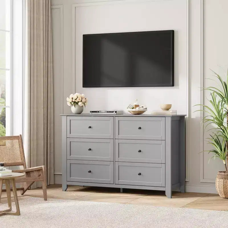 Commode en bois de 120 cm de large avec poignées métalliques ; peut servir de coiffeuse, de meuble TV ou de garde-robe de chambre. Marron